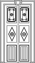 Деревянная дверь с медными орнаментами